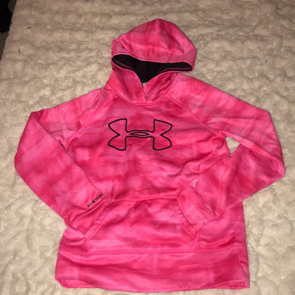Pink Under Armour sweatshirt.